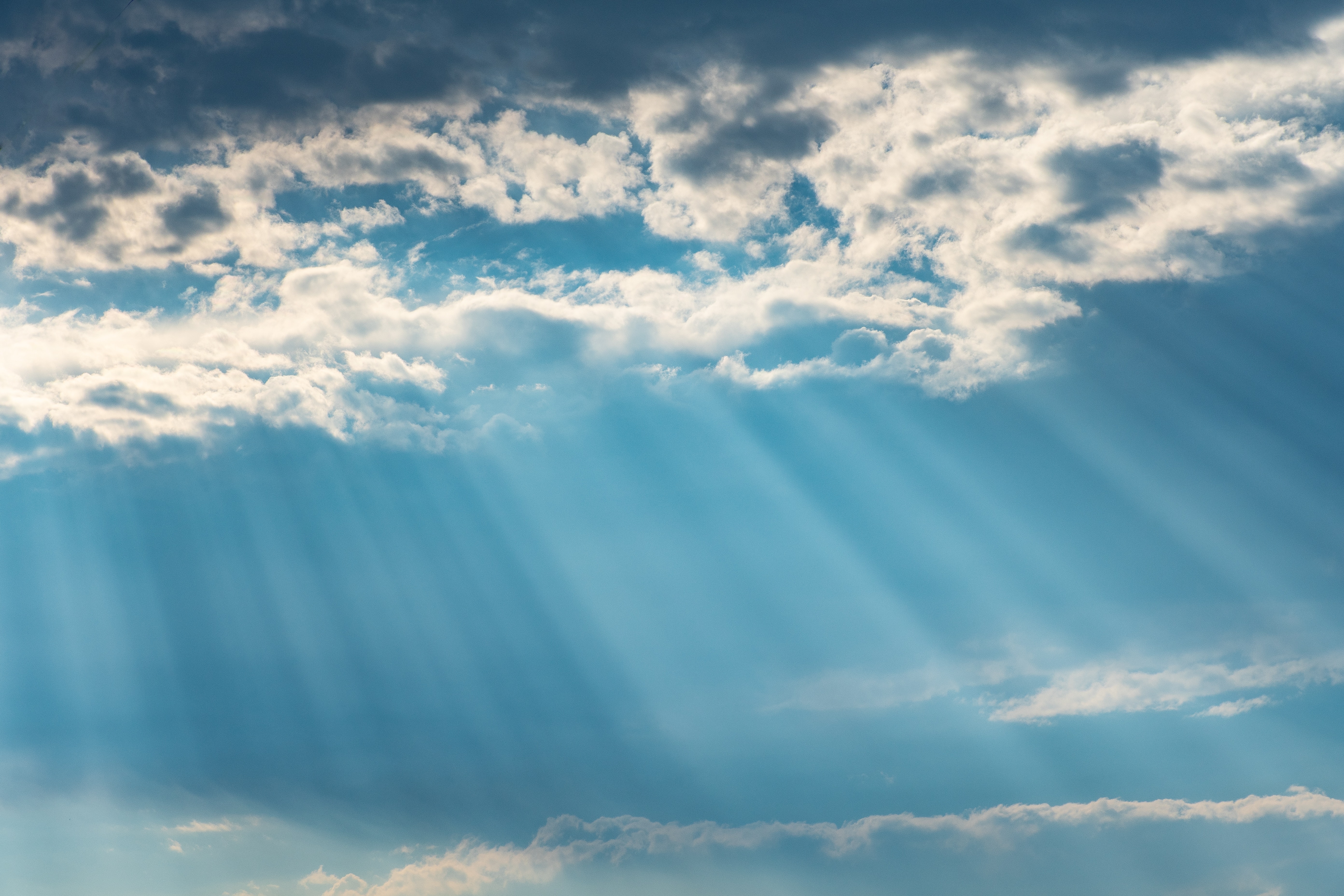 The Sky With A Beautiful Light Blue Color And Clouds