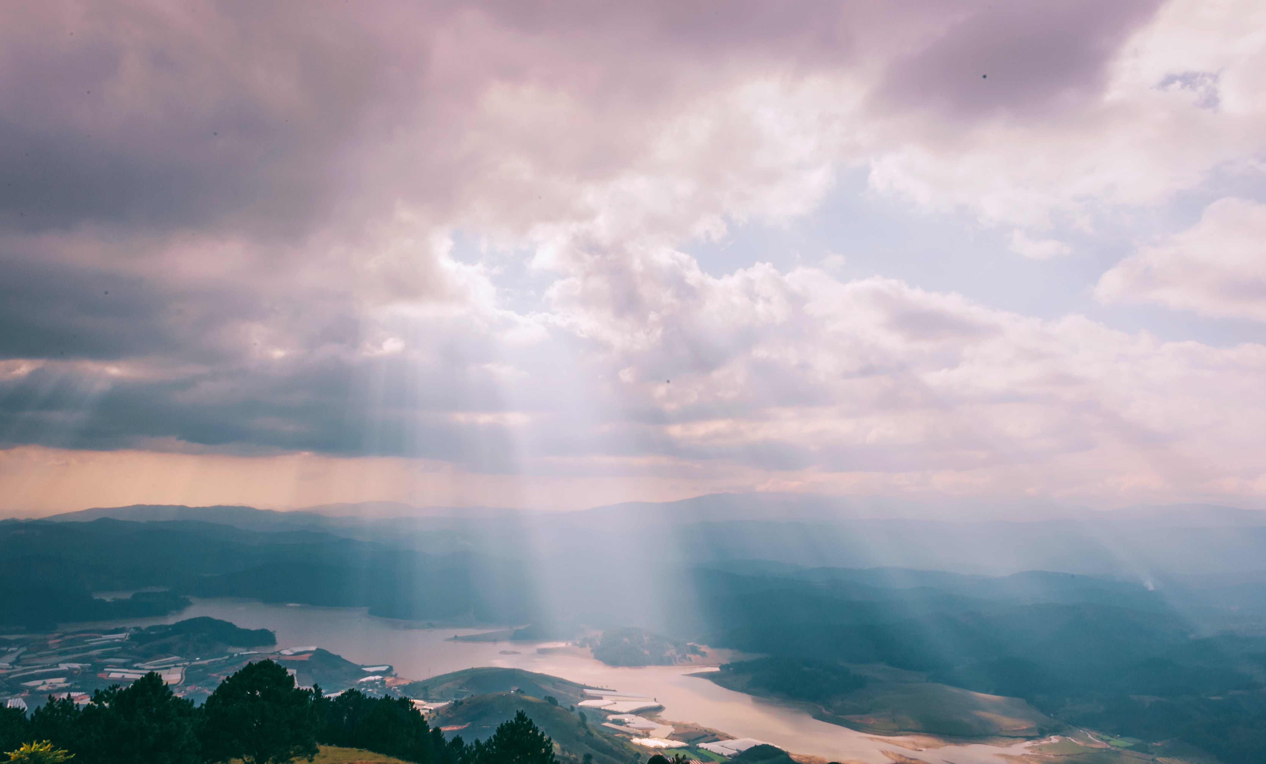 Beautiful And Colorful Sunrays through the Clouds