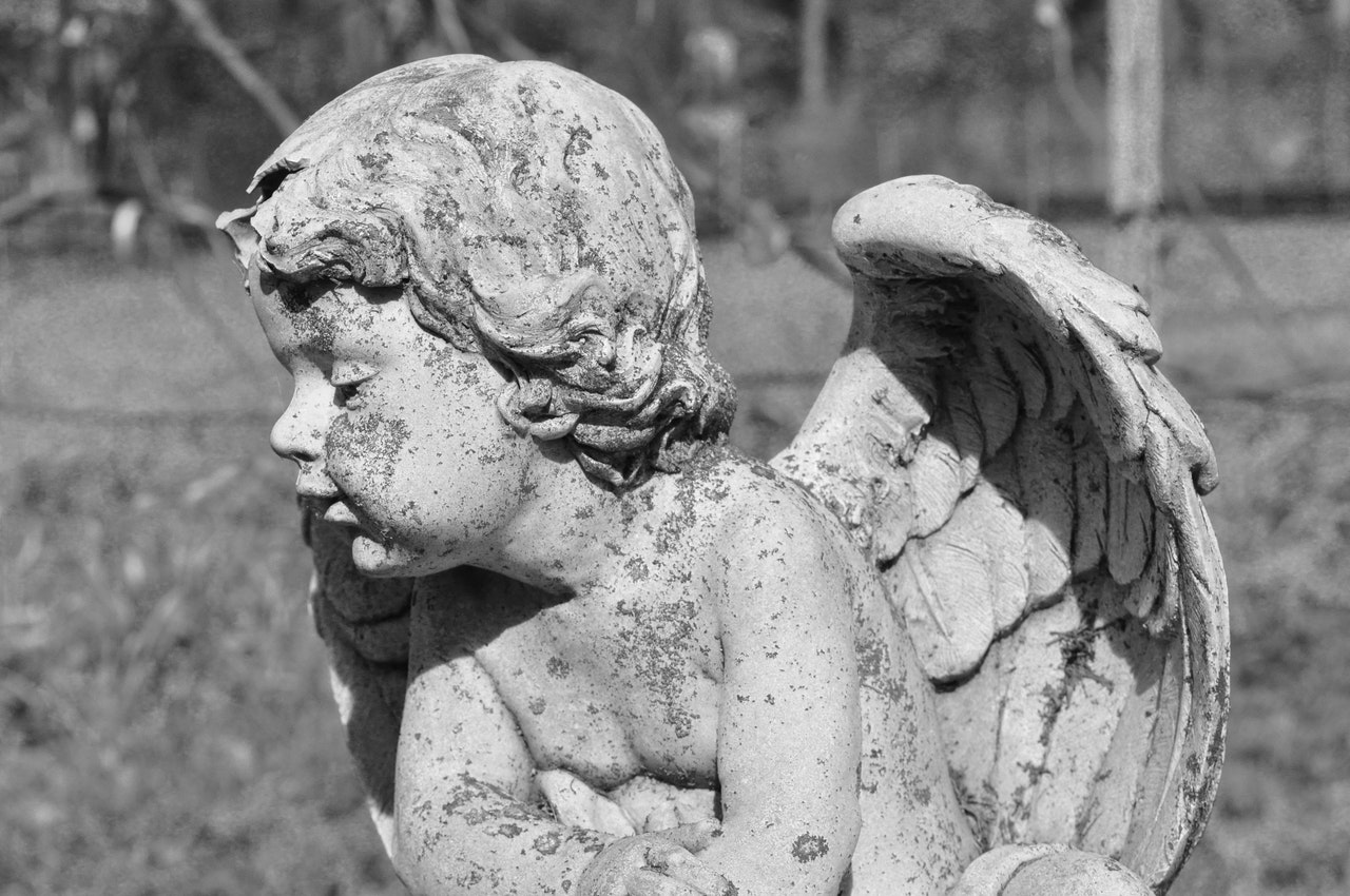 Stained Cherub Statue with wings