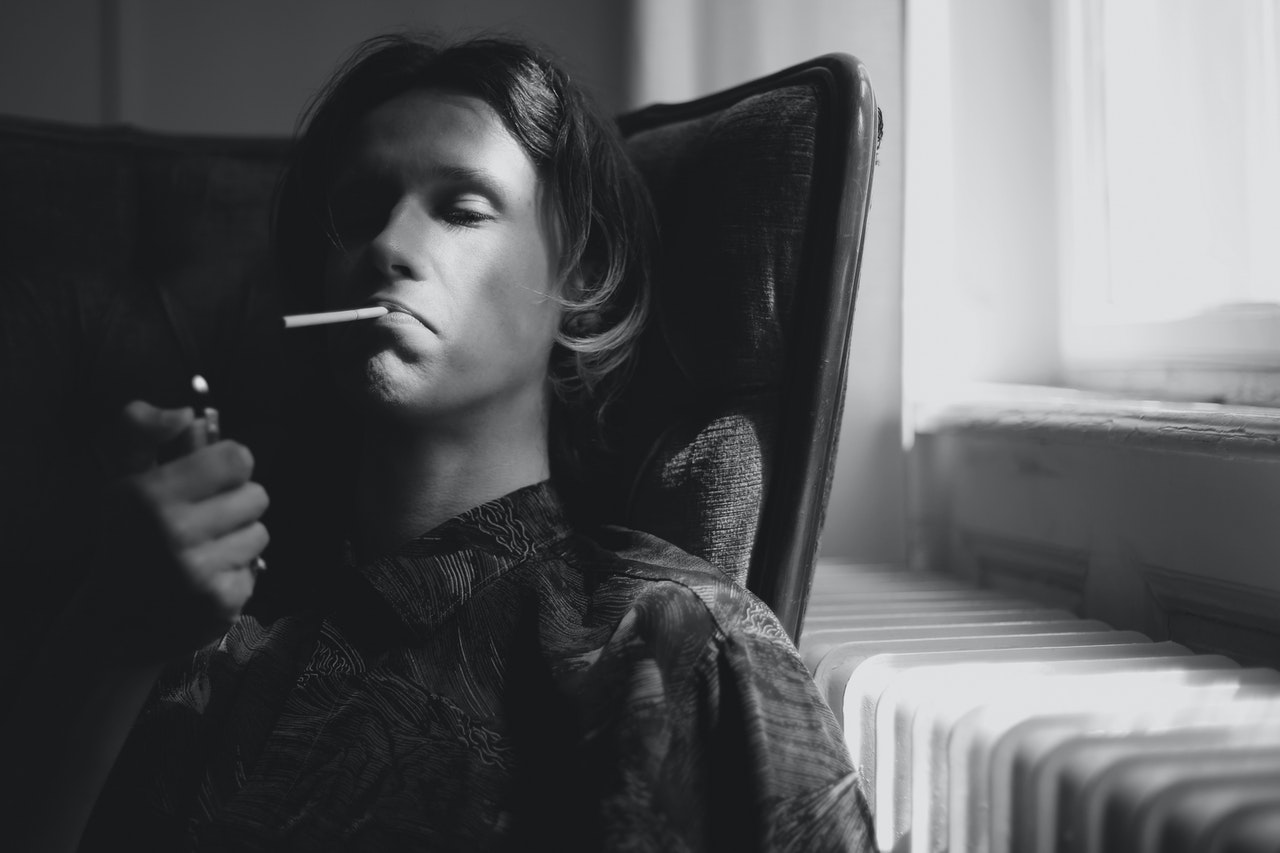 Man lighting a cigarette