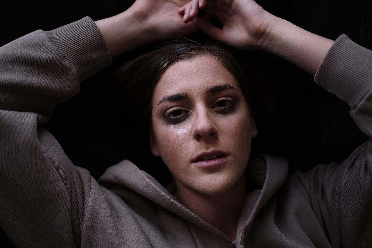 A woman with tears on her face