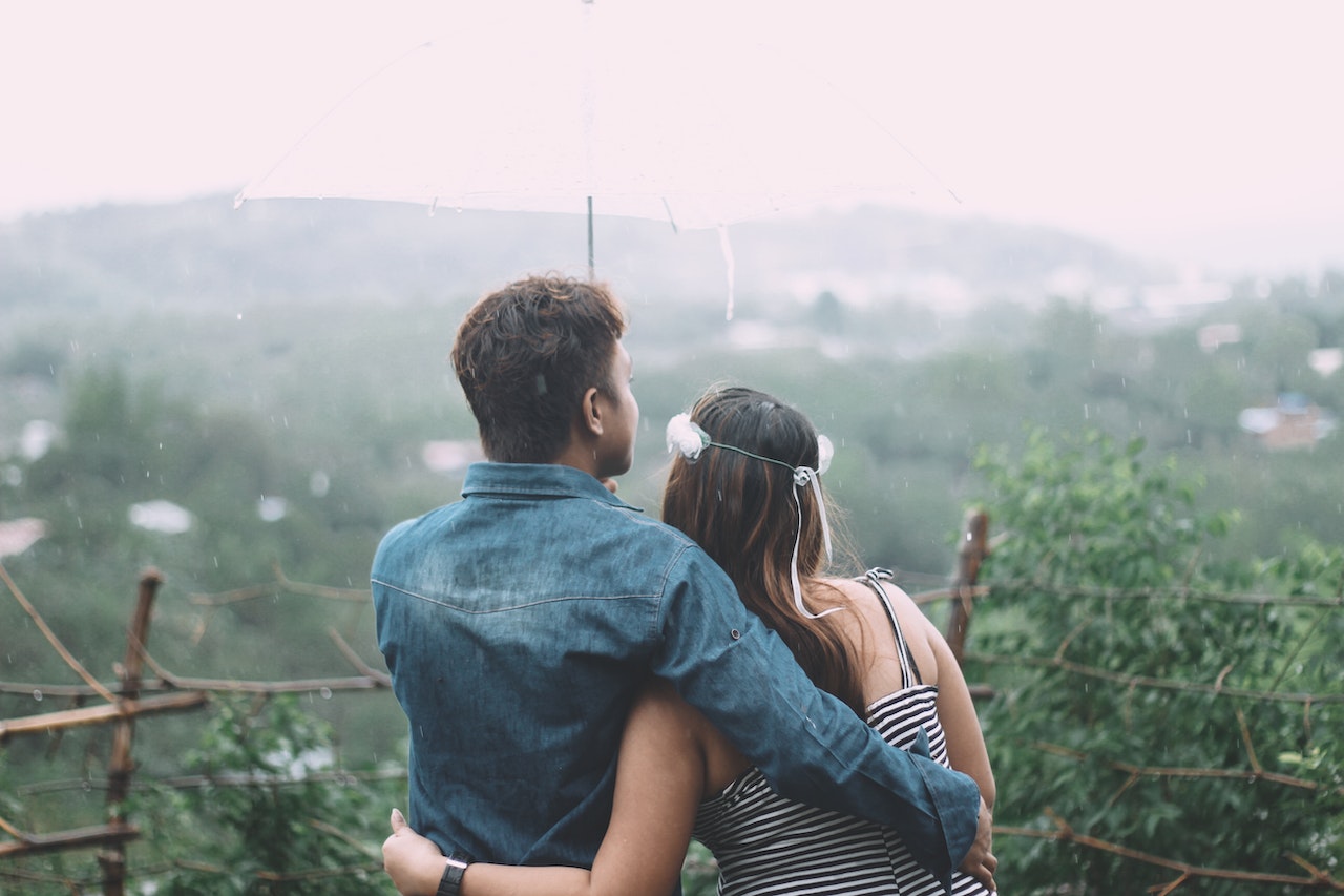Man And Woman Cuddling Each Other