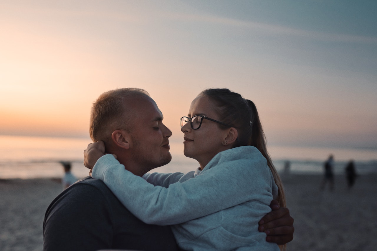 Couple Hugging on Beach