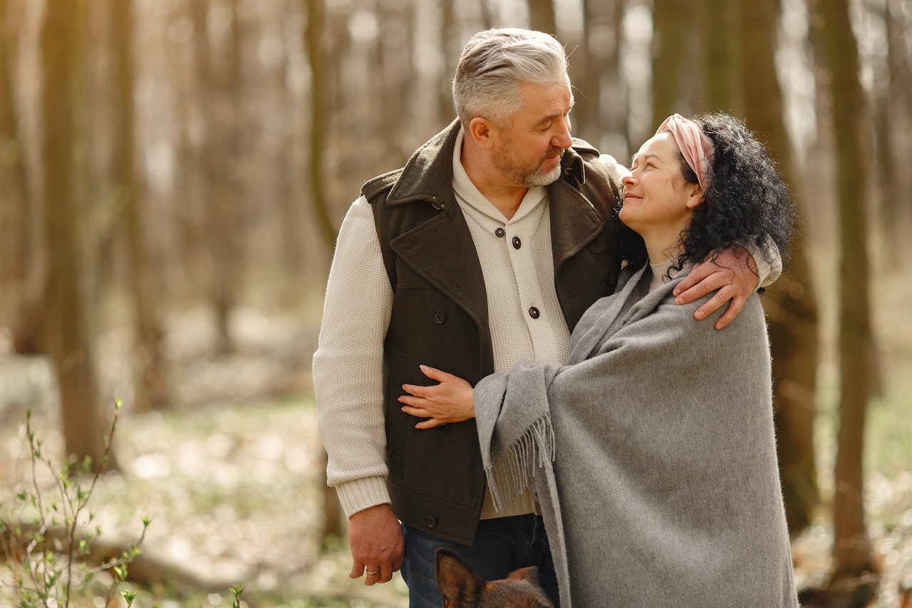 Couple Smiling While Looking at Each Other