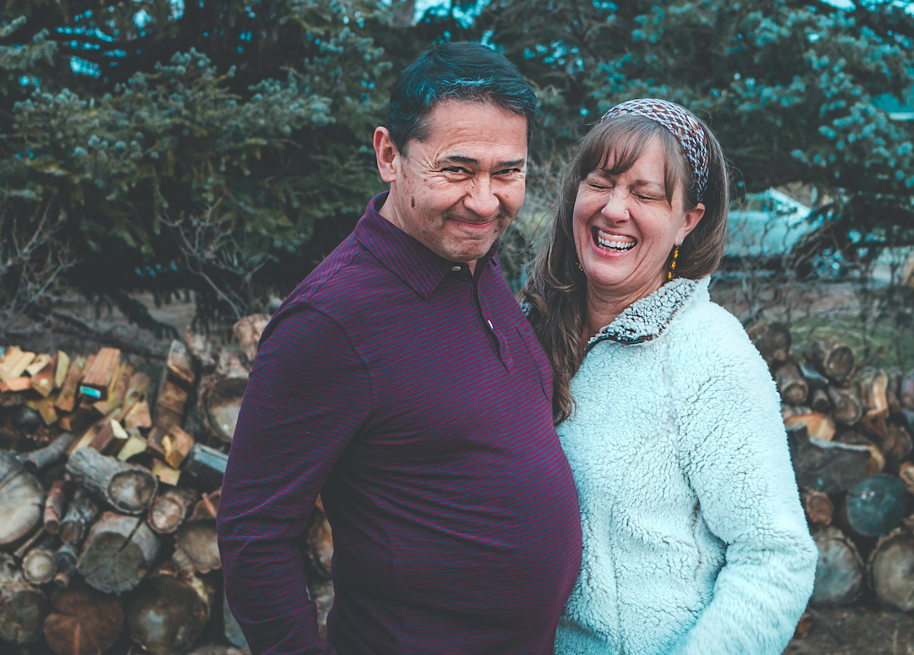 Man Beside Smiling Woman