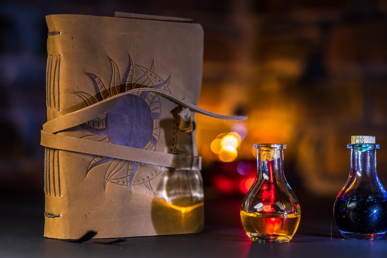 Spell Book beside Potions