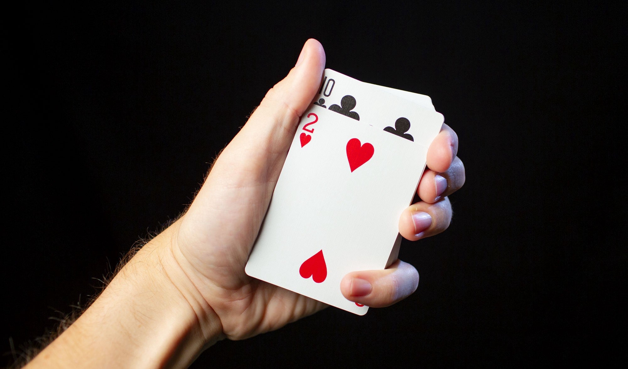 Someone Holding Playing Cards