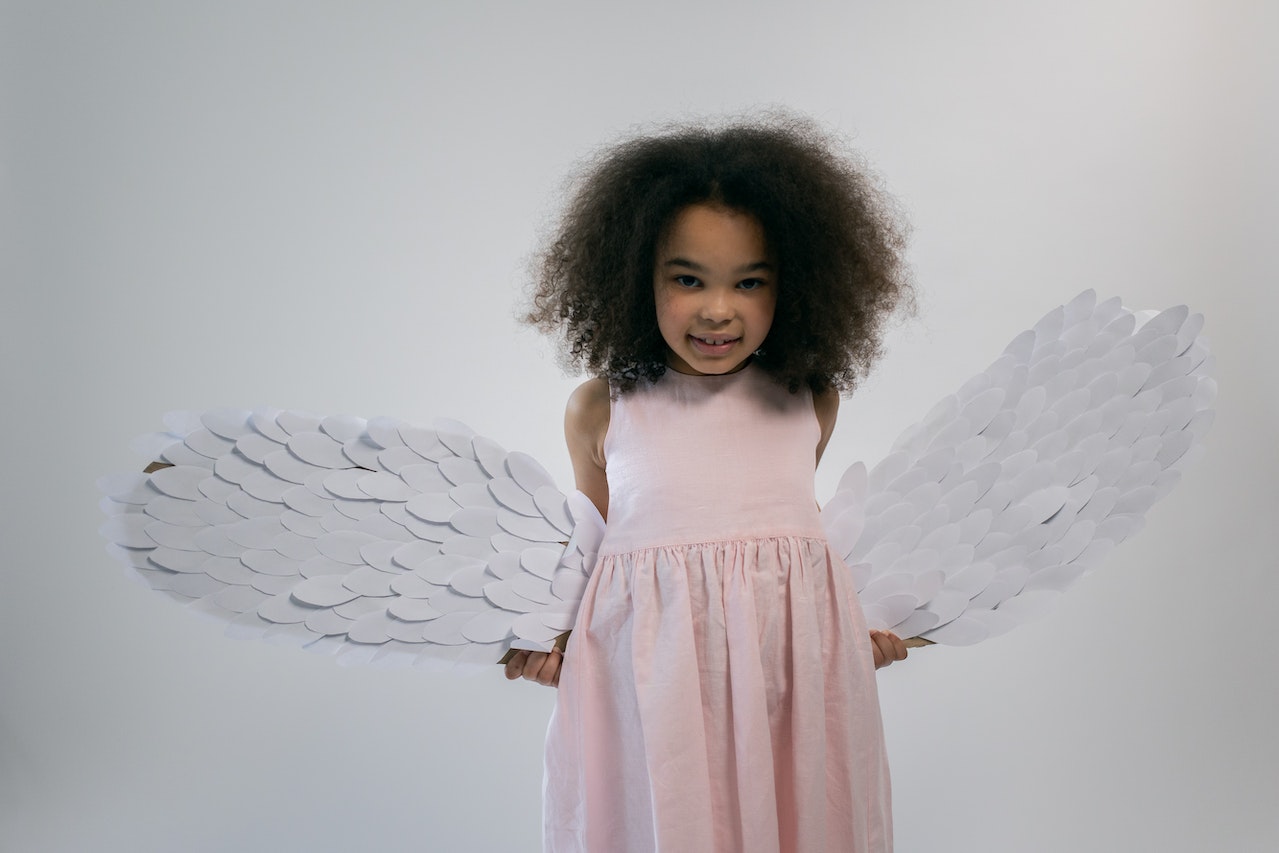 Cute Little African American Kid With Angel Wings
