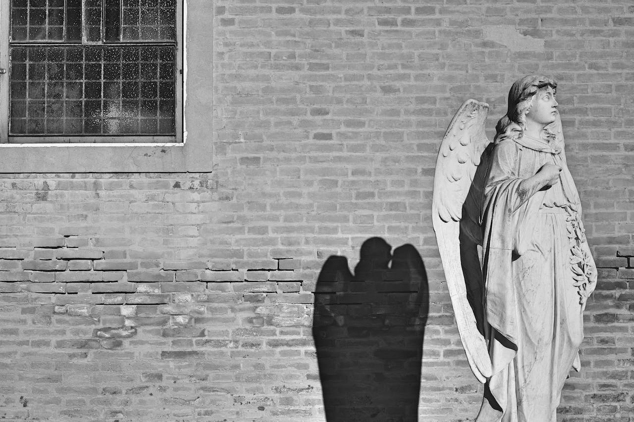 Angel Near Brick Wall