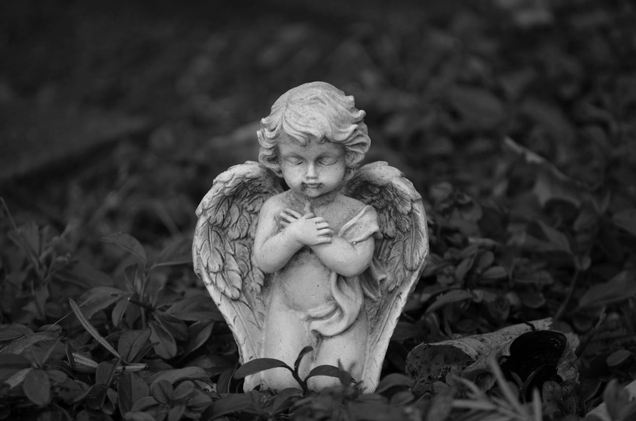Angel Statue Surrounded with Plants