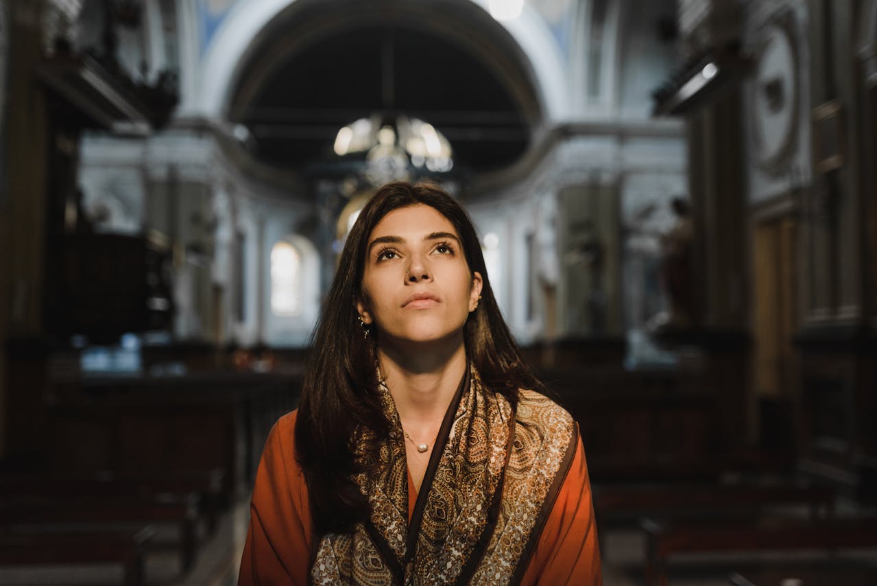 Woman in Black and Brown Scarf